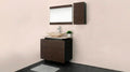 Mueble para baño moderno con lavabo tipo ovalín, espejo y gabinete de madera oscura.