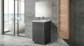 Mueble de baño moderno con lavabo blanco y monomando, frente a espejo grande, sobre piso gris.