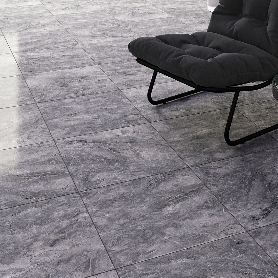 Piso cerámico gris tipo mármol 45x45 cm en sala moderna con sillón negro